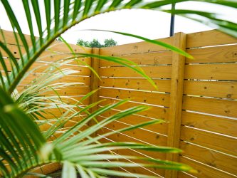 Picture of a horizontal wood fence build by Gator Strong Services in Wilmington, NC